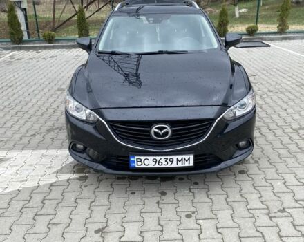 Черный Мазда 6, объемом двигателя 2.2 л и пробегом 250 тыс. км за 10500 $, фото 1 на Automoto.ua