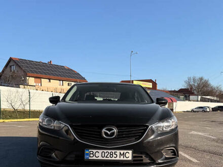 Черный Мазда 6, объемом двигателя 2.49 л и пробегом 242 тыс. км за 11500 $, фото 1 на Automoto.ua