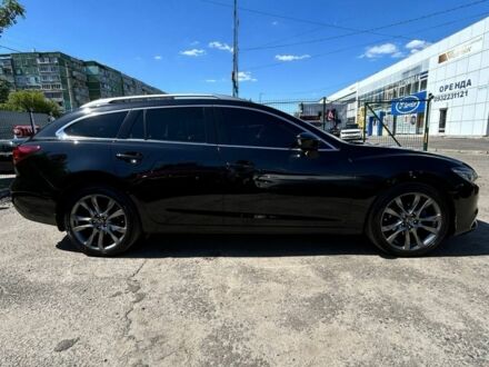 Черный Мазда 6, объемом двигателя 2.2 л и пробегом 214 тыс. км за 13500 $, фото 1 на Automoto.ua