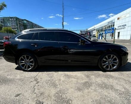 Черный Мазда 6, объемом двигателя 2.2 л и пробегом 214 тыс. км за 13500 $, фото 1 на Automoto.ua