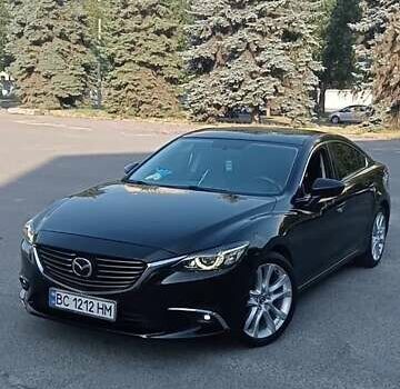 Черный Мазда 6, объемом двигателя 2.49 л и пробегом 157 тыс. км за 12700 $, фото 1 на Automoto.ua