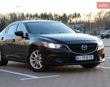 Черный Мазда 6, объемом двигателя 2.5 л и пробегом 179 тыс. км за 11700 $, фото 1 на Automoto.ua