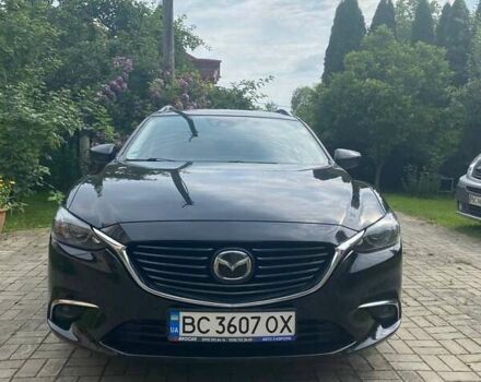 Черный Мазда 6, объемом двигателя 2.19 л и пробегом 270 тыс. км за 11100 $, фото 1 на Automoto.ua
