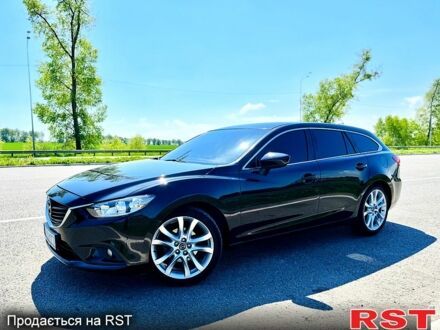 Черный Мазда 6, объемом двигателя 2.2 л и пробегом 67 тыс. км за 15500 $, фото 1 на Automoto.ua