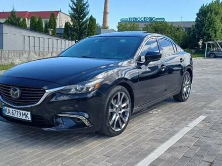 Чорний Мазда 6, об'ємом двигуна 2.49 л та пробігом 210 тис. км за 11800 $, фото 1 на Automoto.ua