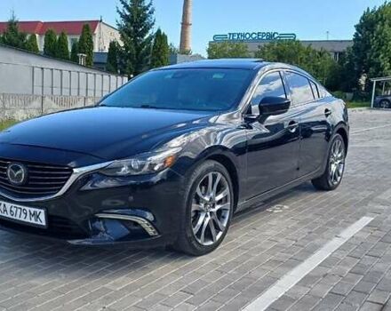 Черный Мазда 6, объемом двигателя 2.49 л и пробегом 210 тыс. км за 11800 $, фото 1 на Automoto.ua