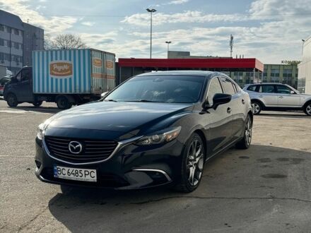 Черный Мазда 6, объемом двигателя 2.49 л и пробегом 175 тыс. км за 13300 $, фото 1 на Automoto.ua