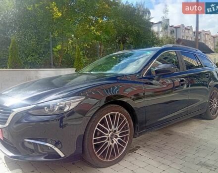 Черный Мазда 6, объемом двигателя 2.2 л и пробегом 236 тыс. км за 12900 $, фото 1 на Automoto.ua