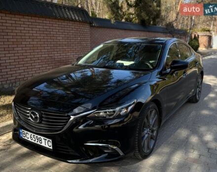 Черный Мазда 6, объемом двигателя 2.49 л и пробегом 185 тыс. км за 13100 $, фото 1 на Automoto.ua