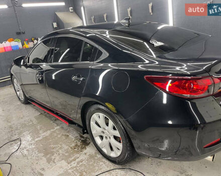 Черный Мазда 6, объемом двигателя 2.49 л и пробегом 244 тыс. км за 13500 $, фото 1 на Automoto.ua