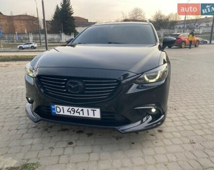 Черный Мазда 6, объемом двигателя 2.19 л и пробегом 246 тыс. км за 14000 $, фото 1 на Automoto.ua