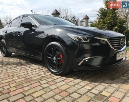 Черный Мазда 6, объемом двигателя 2.5 л и пробегом 77 тыс. км за 16500 $, фото 1 на Automoto.ua