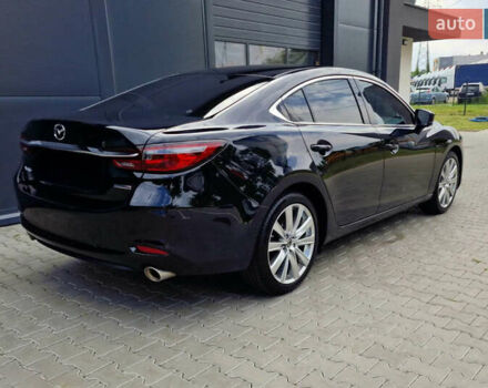 Черный Мазда 6, объемом двигателя 2.49 л и пробегом 100 тыс. км за 15000 $, фото 1 на Automoto.ua