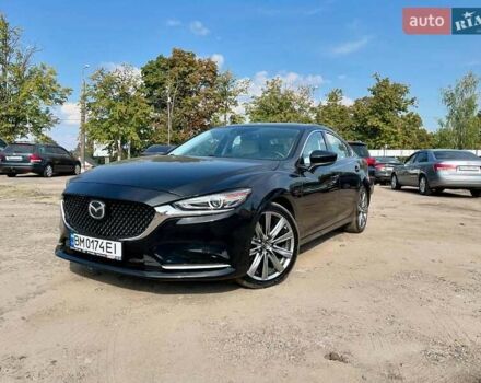 Черный Мазда 6, объемом двигателя 2.49 л и пробегом 141 тыс. км за 19550 $, фото 1 на Automoto.ua