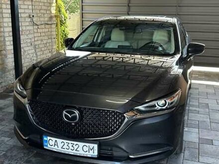 Черный Мазда 6, объемом двигателя 2.49 л и пробегом 125 тыс. км за 19400 $, фото 1 на Automoto.ua