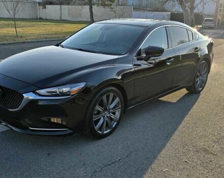 Черный Мазда 6, объемом двигателя 2.5 л и пробегом 193 тыс. км за 9100 $, фото 1 на Automoto.ua