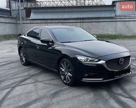 Черный Мазда 6, объемом двигателя 2.49 л и пробегом 66 тыс. км за 15600 $, фото 1 на Automoto.ua