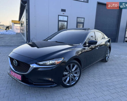 Черный Мазда 6, объемом двигателя 2.49 л и пробегом 146 тыс. км за 14500 $, фото 1 на Automoto.ua