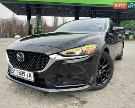 Черный Мазда 6, объемом двигателя 2.49 л и пробегом 75 тыс. км за 17900 $, фото 1 на Automoto.ua