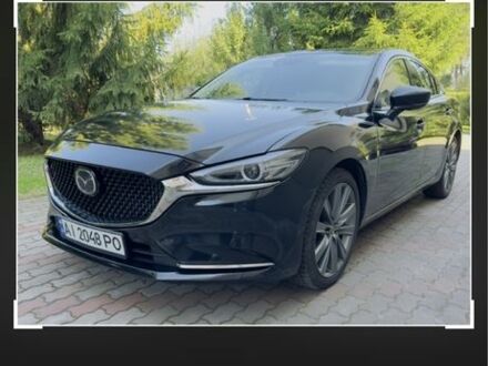 Черный Мазда 6, объемом двигателя 2.5 л и пробегом 100 тыс. км за 17499 $, фото 1 на Automoto.ua