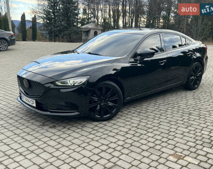 Черный Мазда 6, объемом двигателя 2.49 л и пробегом 136 тыс. км за 17999 $, фото 1 на Automoto.ua