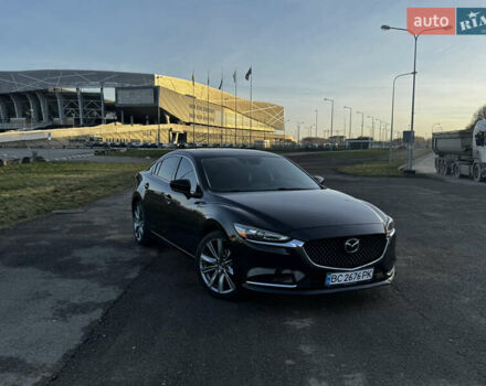 Черный Мазда 6, объемом двигателя 2.49 л и пробегом 118 тыс. км за 14700 $, фото 1 на Automoto.ua