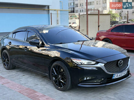 Черный Мазда 6, объемом двигателя 2.49 л и пробегом 98 тыс. км за 15000 $, фото 1 на Automoto.ua