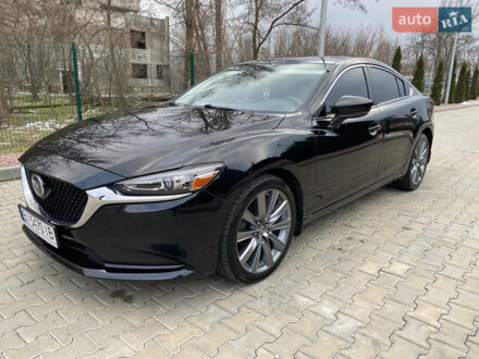 Черный Мазда 6, объемом двигателя 2.49 л и пробегом 109 тыс. км за 16500 $, фото 1 на Automoto.ua