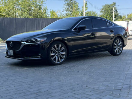 Черный Мазда 6, объемом двигателя 2.49 л и пробегом 146 тыс. км за 16999 $, фото 1 на Automoto.ua