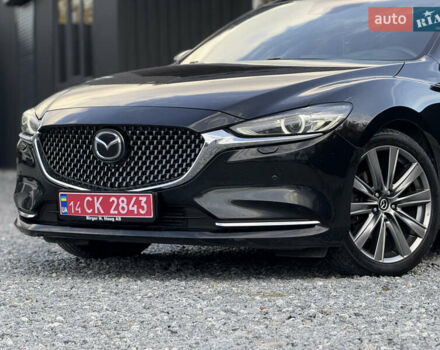 Черный Мазда 6, объемом двигателя 2.2 л и пробегом 178 тыс. км за 19450 $, фото 1 на Automoto.ua