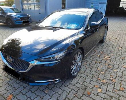 Черный Мазда 6, объемом двигателя 2.5 л и пробегом 79 тыс. км за 9700 $, фото 1 на Automoto.ua