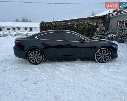 Черный Мазда 6, объемом двигателя 2.49 л и пробегом 158 тыс. км за 19800 $, фото 1 на Automoto.ua