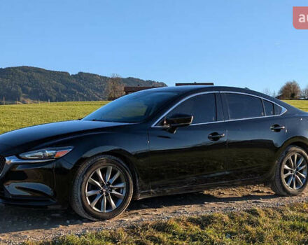 Черный Мазда 6, объемом двигателя 2.49 л и пробегом 111 тыс. км за 16500 $, фото 1 на Automoto.ua