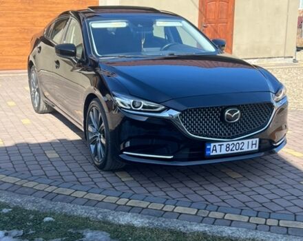 Черный Мазда 6, объемом двигателя 2.49 л и пробегом 97 тыс. км за 18450 $, фото 1 на Automoto.ua