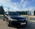 Фиолетовый Мазда 6, объемом двигателя 2 л и пробегом 304 тыс. км за 3000 $, фото 1 на Automoto.ua