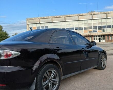 Фіолетовий Мазда 6, об'ємом двигуна 2 л та пробігом 304 тис. км за 2940 $, фото 1 на Automoto.ua