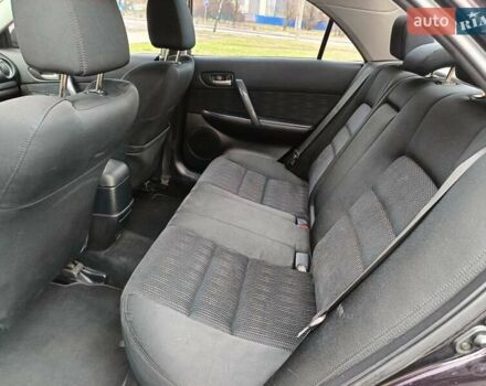 Фиолетовый Мазда 6, объемом двигателя 2 л и пробегом 190 тыс. км за 4450 $, фото 10 на Automoto.ua