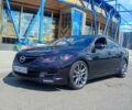 Фиолетовый Мазда 6, объемом двигателя 2 л и пробегом 245 тыс. км за 7999 $, фото 1 на Automoto.ua