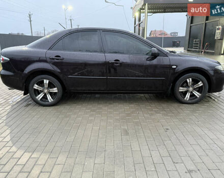 Фиолетовый Мазда 6, объемом двигателя 1.8 л и пробегом 189 тыс. км за 5999 $, фото 6 на Automoto.ua