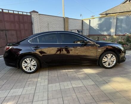 Фиолетовый Мазда 6, объемом двигателя 1.8 л и пробегом 80 тыс. км за 8900 $, фото 5 на Automoto.ua