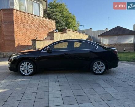 Фиолетовый Мазда 6, объемом двигателя 1.8 л и пробегом 80 тыс. км за 8900 $, фото 6 на Automoto.ua