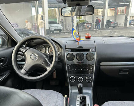 Фиолетовый Мазда 6, объемом двигателя 2.3 л и пробегом 240 тыс. км за 4450 $, фото 17 на Automoto.ua