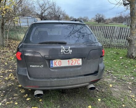 Фиолетовый Мазда 6, объемом двигателя 2 л и пробегом 228 тыс. км за 3650 $, фото 1 на Automoto.ua