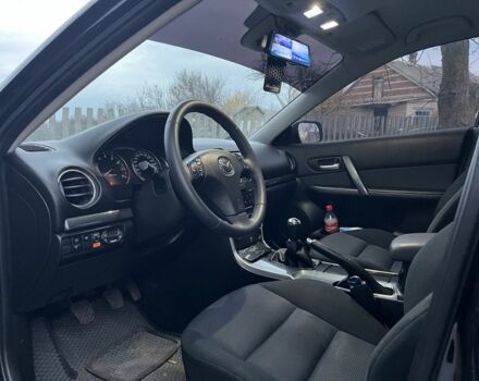 Фиолетовый Мазда 6, объемом двигателя 2 л и пробегом 228 тыс. км за 3650 $, фото 9 на Automoto.ua