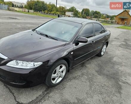 Фиолетовый Мазда 6, объемом двигателя 2 л и пробегом 110 тыс. км за 4700 $, фото 6 на Automoto.ua