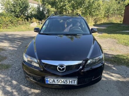 Фиолетовый Мазда 6, объемом двигателя 2 л и пробегом 219 тыс. км за 5000 $, фото 1 на Automoto.ua