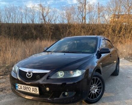 Фиолетовый Мазда 6, объемом двигателя 2 л и пробегом 350 тыс. км за 3200 $, фото 1 на Automoto.ua