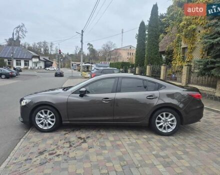 Коричневый Мазда 6, объемом двигателя 2 л и пробегом 127 тыс. км за 14999 $, фото 1 на Automoto.ua