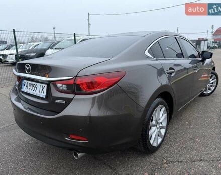 Коричневий Мазда 6, об'ємом двигуна 2 л та пробігом 198 тис. км за 13300 $, фото 5 на Automoto.ua
