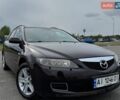 Коричневый Мазда 6, объемом двигателя 2 л и пробегом 345 тыс. км за 3900 $, фото 1 на Automoto.ua